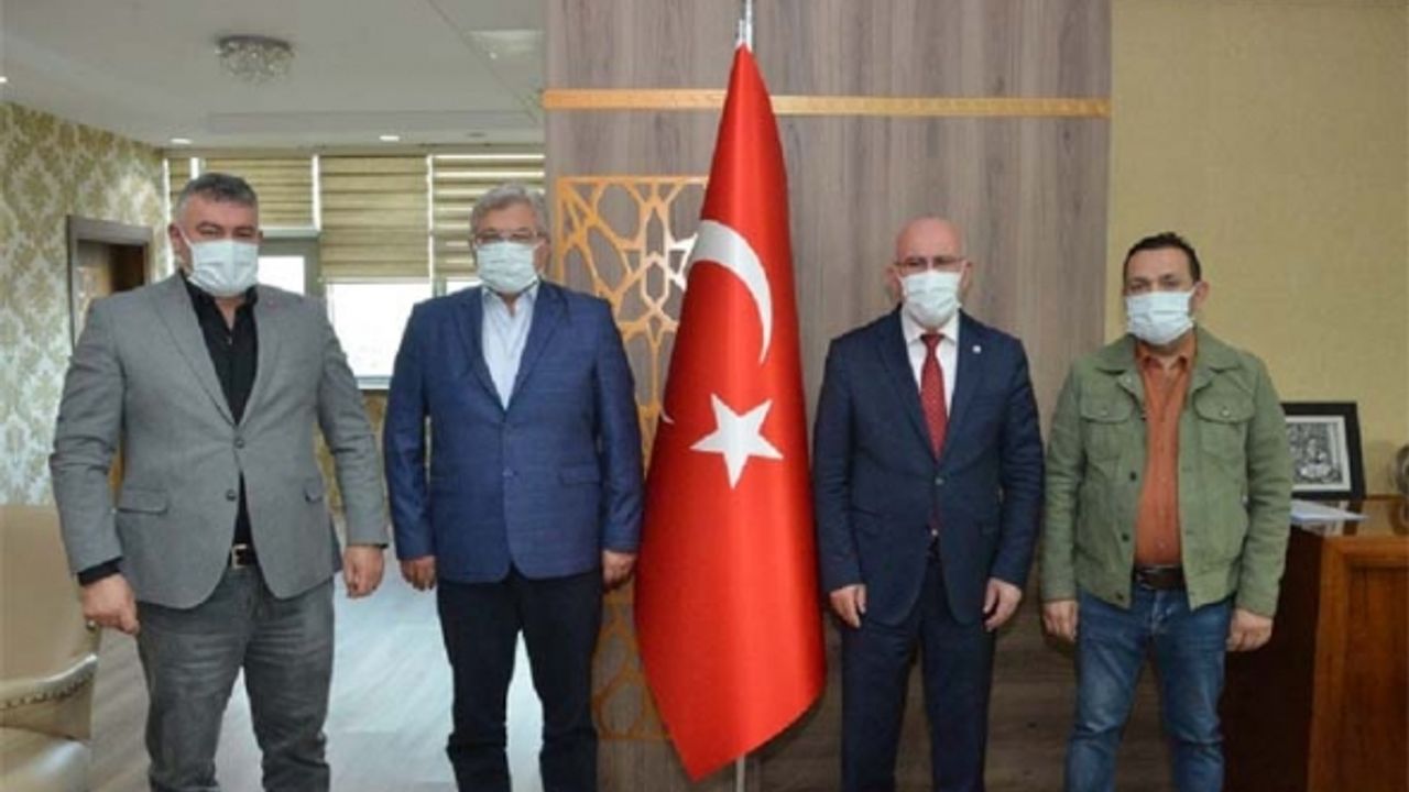 Uşak Deri Karma OSB'den tekrar atanan Rektör Savaş'a ziyaret