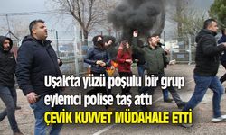 Uşak'ta yüzü poşulu bir grup eylemci polise taş attı