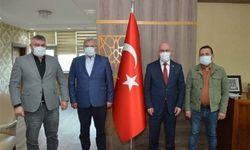 Uşak Deri Karma OSB'den tekrar atanan Rektör Savaş'a ziyaret